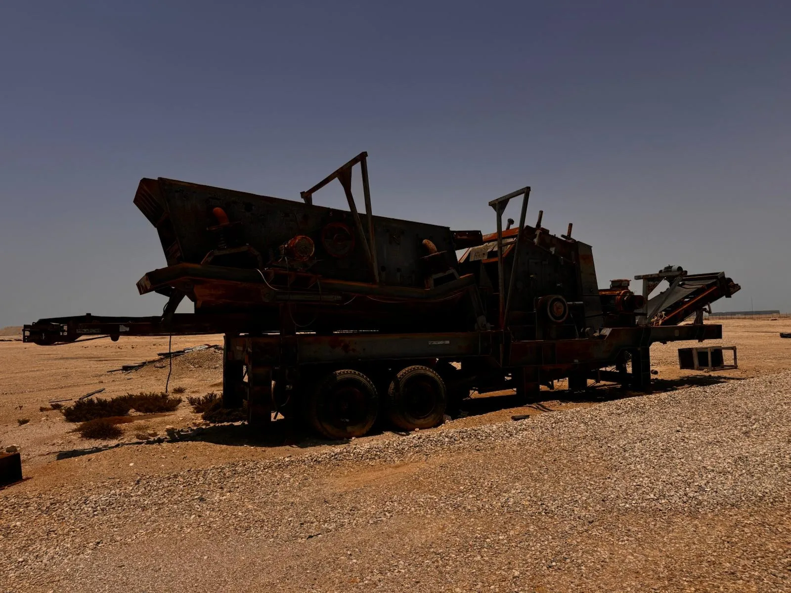Crushing line on site, with aggregate stockpile